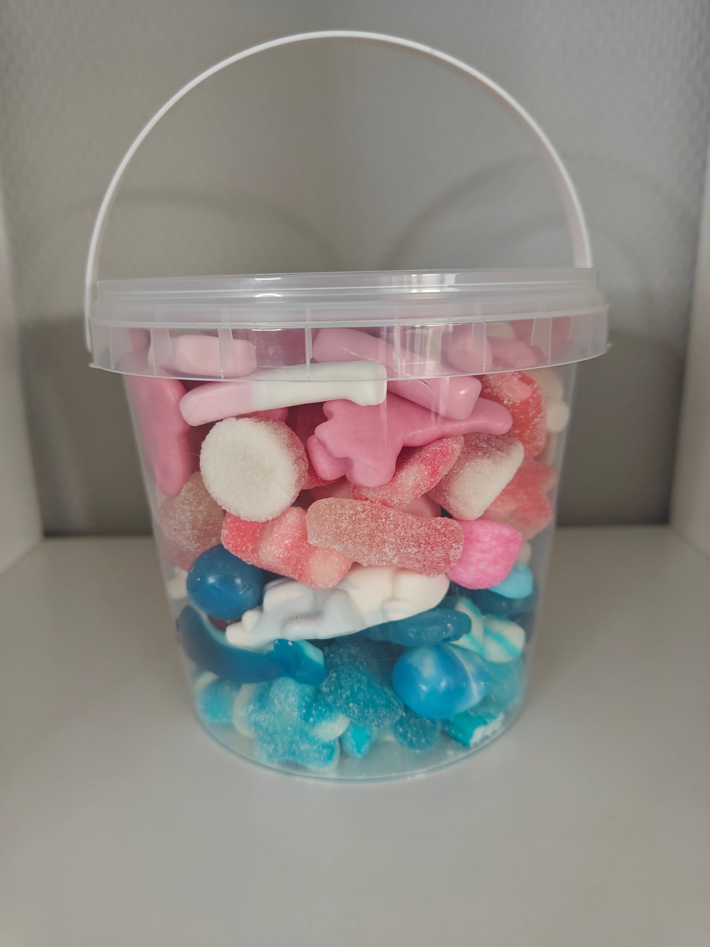 1. Seau de bonbons 🍬 bleu et rose 700 gr