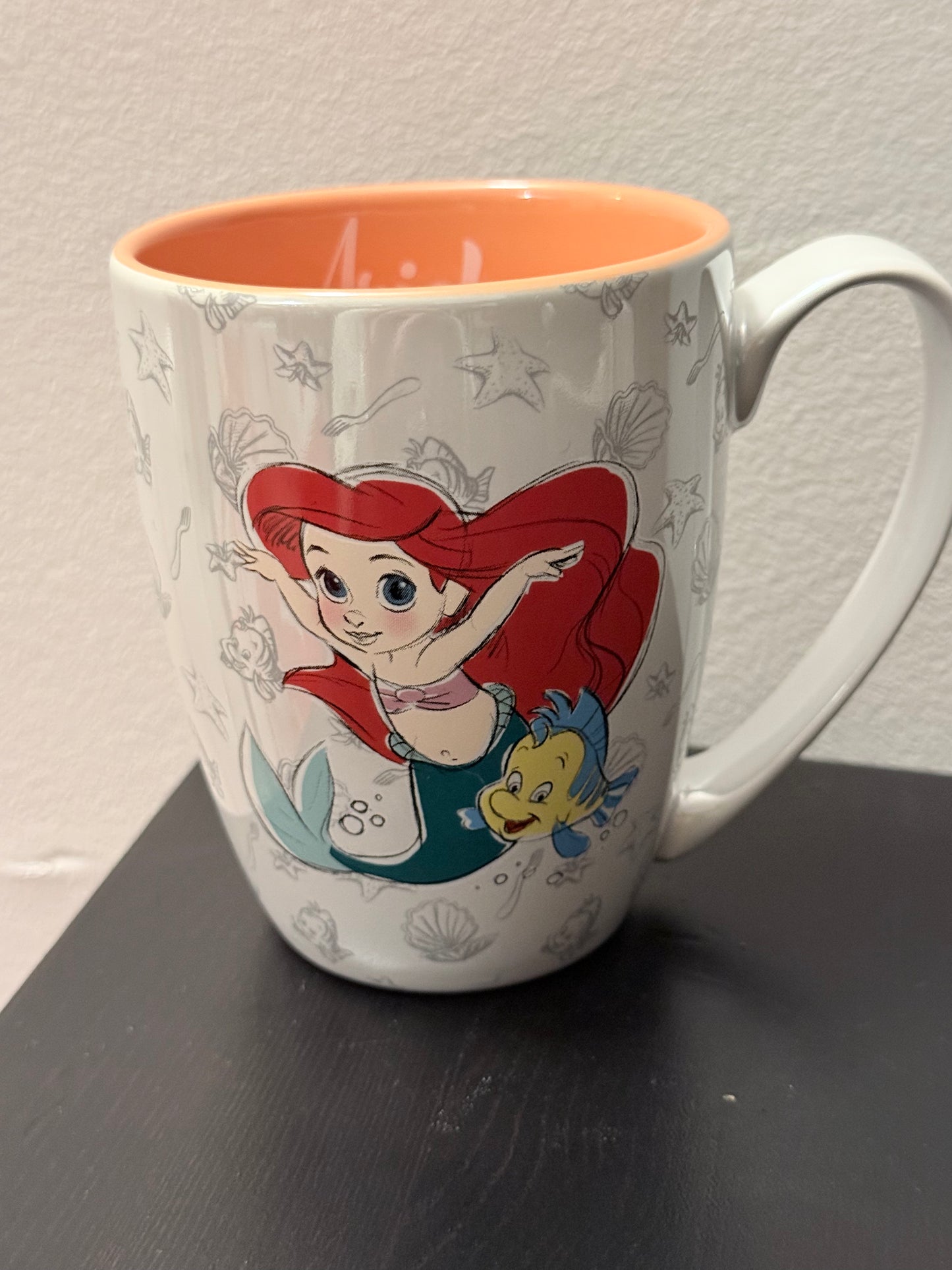 Tasse ariel orange avec 200 gr de bonbons