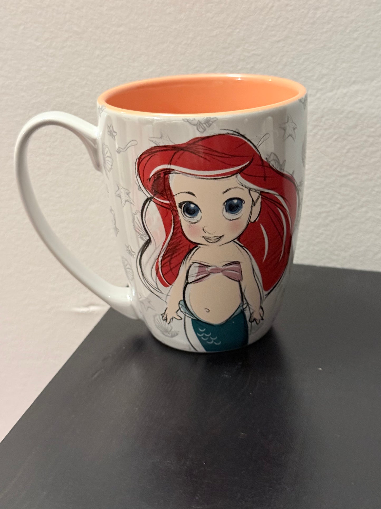 Tasse ariel orange avec 200 gr de bonbons