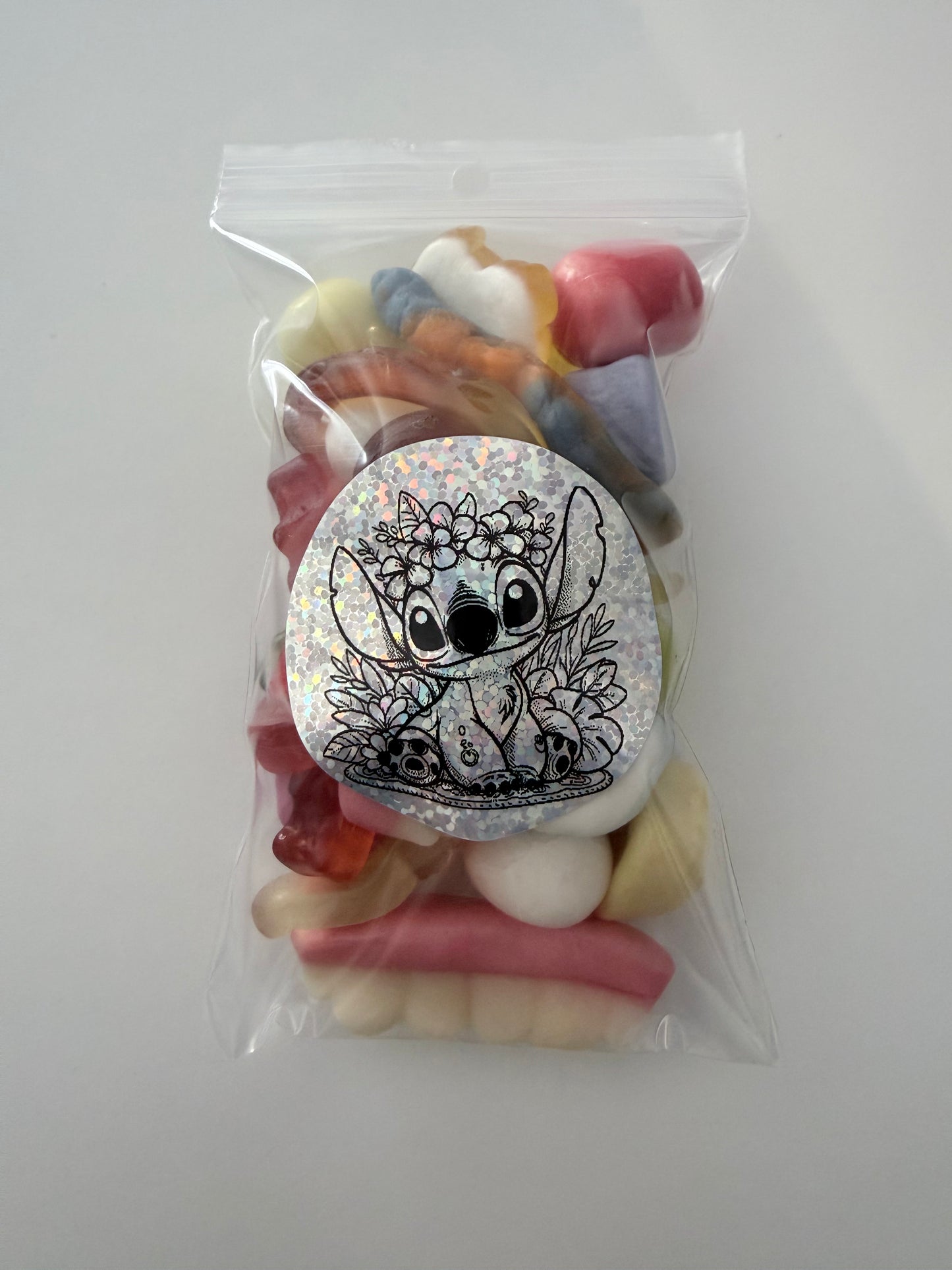 Sachet stitch gris couronne tête 100 gr bonbons mélange