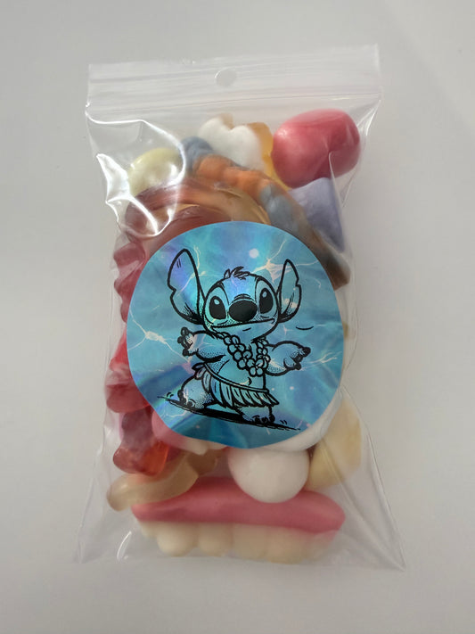 Sachet stitch bleu collier fleur 100 gr bonbons mélange